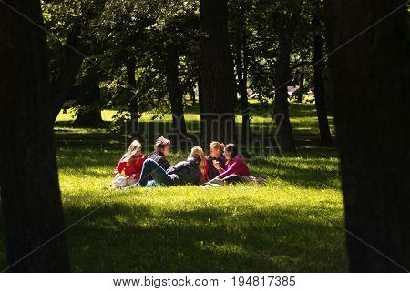 St. Petersburg Russia - June 28 2017: Picnic on the grass in Peterhof in St. Petersburg