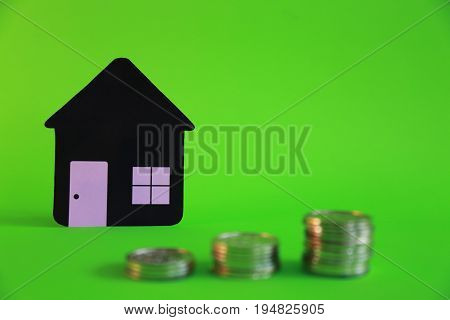 Concept morgage payment stack coins green background