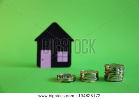 Morgage savings concept real estate green background