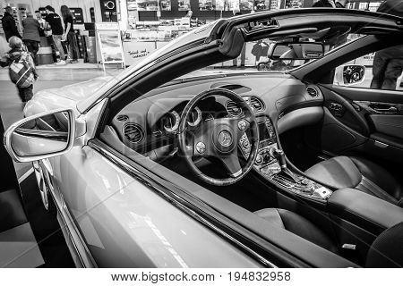 STUTTGART GERMANY - MARCH 17 2016: Cabin of grand tourer car Mercedes-Benz SL500 (R230) 2008. Black and white. Europe's greatest classic car exhibition 