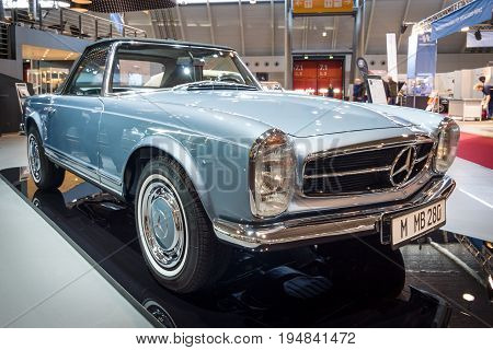 STUTTGART GERMANY - MARCH 18 2016: Sports car Mercedes-Benz 280 SL (W113) 1968. Europe's greatest classic car exhibition 