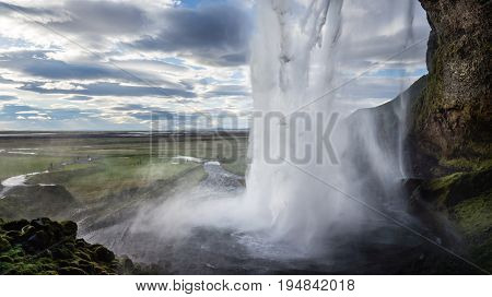 Seljalandsfoss is one of the best known waterfalls in Iceland. Seljalandsfoss is located in the South Region in Iceland right by Route 1