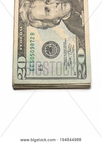 A Stack of Twenty Dollar Bills on a White Background