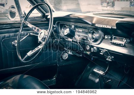 STUTTGART GERMANY - MARCH 18 2016: Cabin of Ford Mustang Fastback 1965. Stylization. Toning. Europe's greatest classic car exhibition 