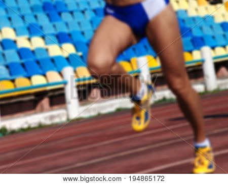Blurred Athletic Running Competition At Stadium Not In Focus