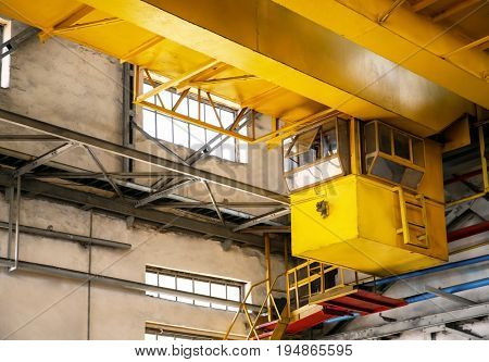 Overhead crane in factory workshop