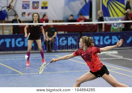 ST. PETERSBURG, RUSSIA - JULY 7, 2017: Anastasiya Cherniavskaya of Belarus (in front) vs Olga Arkhangelskaya of Russia in 3rd day of badminton tournament White Nights. Arkhangelskaya won 2-0