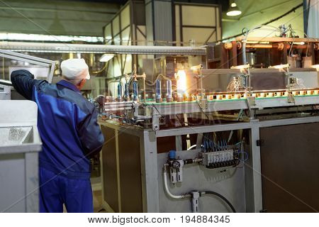 ST. PETERSBURG, RUSSIA - JUNE 29, 2017: Worker in the drinking water factory of Lider-Aqua  LTD. The factory is certified by regional quality certification program