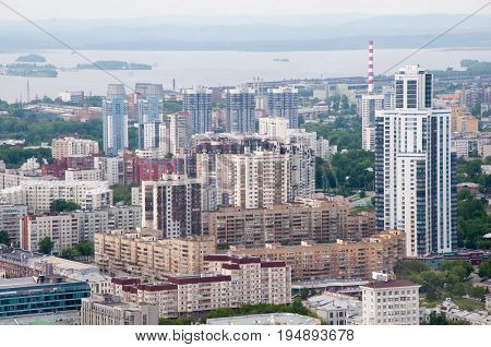 Yekaterinburg, Russia - June 3, 2017: A View At The Modern Residential Complexes And Old Houses On T