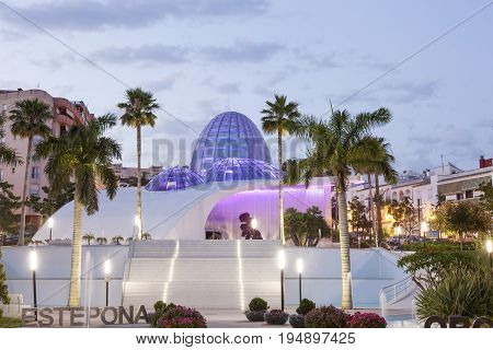 Estepona Spain - May 31 2017: The orchidarium of Estepona illuminated at dusk. City of Estepona Malaga Province Spain