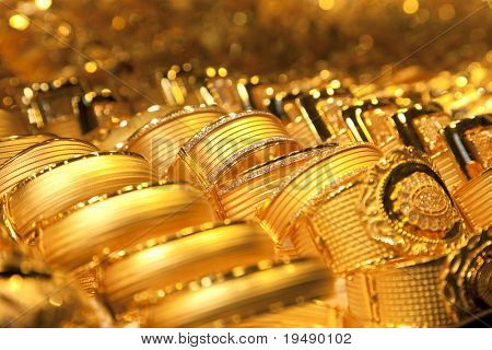 金の宝石類の背景/ソフト セレクティブ フォーカス