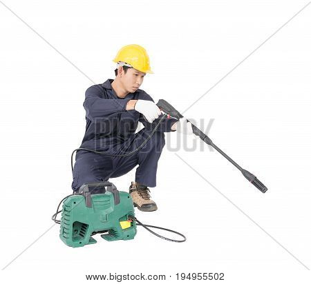 Young Man Sitting And Holding High Pressure Water Gun