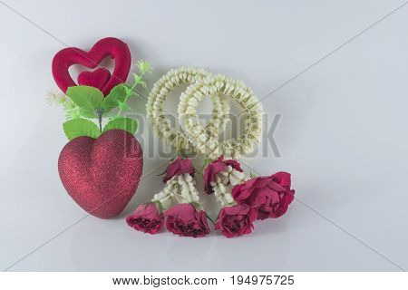 Thai flower decoration. Jasmine heart shape on white background