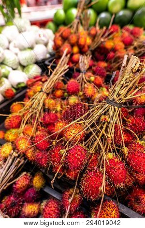 Healthy Fruits Rambutans Background, Red Healthy Fruits Rambutans, Rambutans In A Supermarket Local 