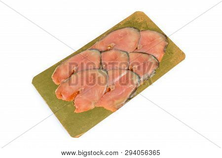 Slices Of Smoked Pink Salmon On The Cardboard Laminated Food Substrate On A White Background