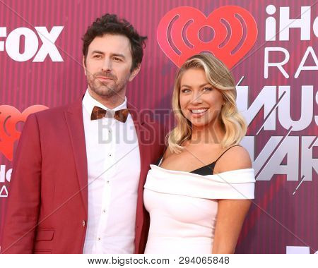 LOS ANGELES - MAR 14:  Beau Clark, Stassi Schroeder at the iHeart Radio Music Awards - Arrivals at the Microsoft Theater on March 14, 2019 in Los Angeles, CA