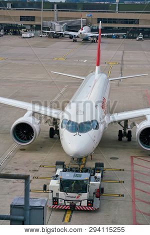 ZURICH, SWITZERLAND - CIRCA OCTOBER, 2018: an Swiss aircraft on pushback at Zurich International Airport.