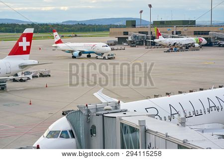 ZURICH, SWITZERLAND - CIRCA OCTOBER, 2018: Austrian Airlines aircraft on pushback at Zurich International Airport.