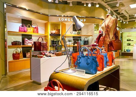 ZURICH, SWITZERLAND - CIRCA OCTOBER, 2018: Longchamp handbags on display at a shop in Zurich International Airport.