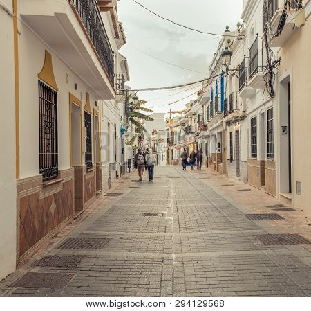 Nerja, Malaga, Andalusi, Spain - March 20, 2019: Carabeo Street, Main Street Of The Coastal Town Of 