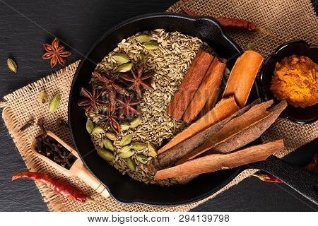Exotic Herbal Food Concept Mix Of The Organic Spices Cinnamon Stick, Cardamom Pods, Cloves, Star Ani