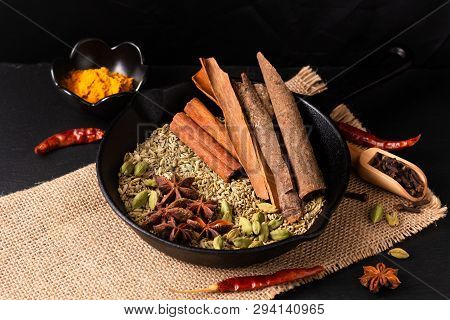 Exotic Herbal Food Concept Mix Of The Organic Spices Cinnamon Stick, Cardamom Pods, Cloves, Star Ani
