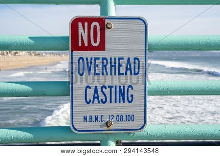 Manhattan Beach, Ca - March 20, 2019: Sign Warns Visitors And Fishermen Of The No Overhead Casting R