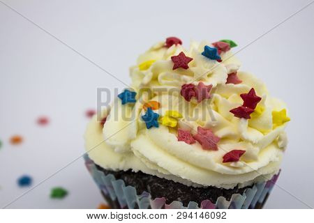 Muffin. Chocolate Muffin, Chocolate Muffin With Cream And Berries, Place For Text