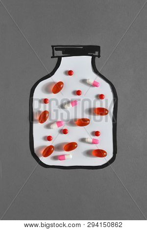 A Drawn Canister With Pills In It