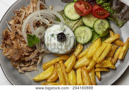 Overview Of Greek Gyros With Tzaziki And Fries