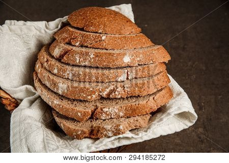 Bread In Bread Box On The Wooden Table