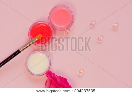 Lip Balms, Neutral And With Shades. Lip Skin Care, Hygiene And Cosmetics. Three Jars Of Balm On A Pi