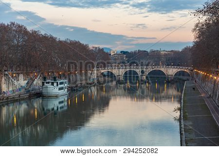Ancient Roman Stone Bridge Over The Tiber River, Rome, Italy