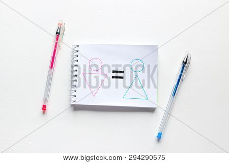 Notebook With A Painted Gender Equality On A White Background