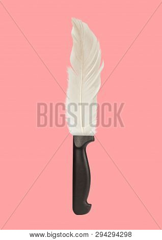 The Lightest Touch. An Alternative Blade With White Feather As A Bit Against Trendy Coral Background