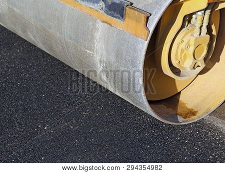 Huge Roller The Road Roller And The Asphalt Of The New Road