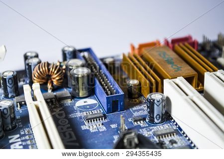 Zelenodolsk, Ukraine. 5.01.2019. The Old Motherboard From The Computer Of Blue Color. Texture. Spare