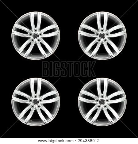 Set Of Four Car Rims. Aluminium Car Rims Isolated On A Black Background. Modern And Trendy Car Rims.