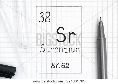 The Periodic Table Of Elements. Handwriting Chemical Element Strontium Sr With Black Pen, Test Tube 