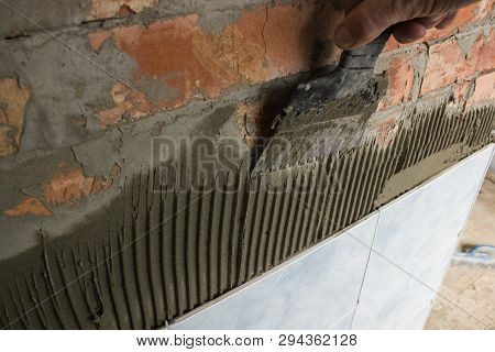 Working With Mortar Tiling A Bathroom Wall