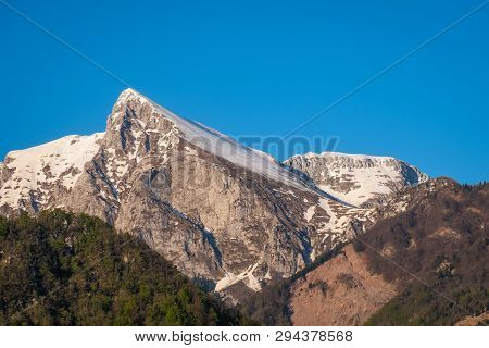 View From Village Kobarid In Soca Valley To Summit Of Mountain Krn In Julian Alps In Slovenia