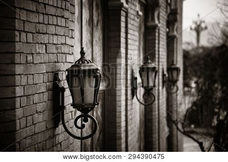 Road lamp and wall window patterns in Xiahao Old street in Chongqing, China.