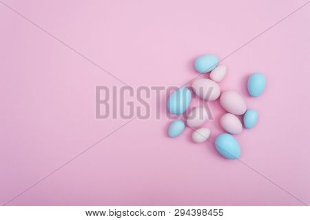 Pink And Blue Pastel Preaded Easter Eggs On Pink Background