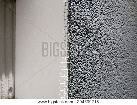 Building Wall Cut With Styrofoam, Plastic Armored Grid And Waterproof Stucco Plaster