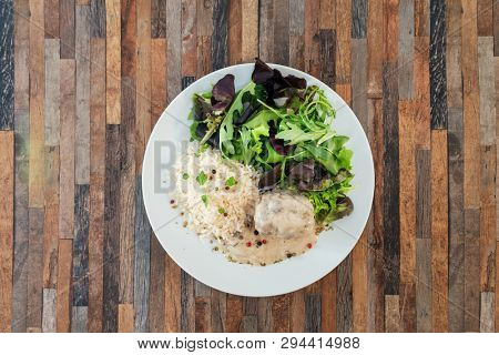 Veal Paupiette stewed with cream and rice