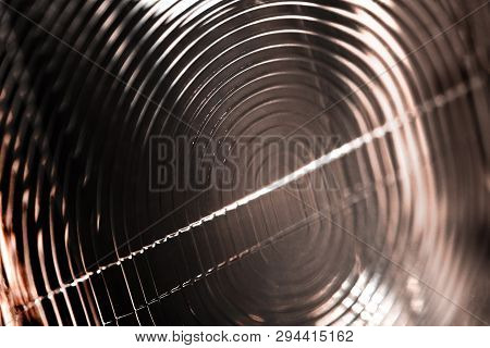 The Deflector Is A Small Flash Closeup. Shallow Depth Of Field. Alternation Of Shadows And Light.