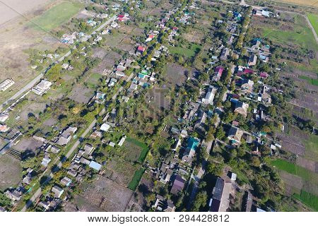 Top View Of The Village. One Can See The Roofs Of The Houses And Gardens. Road The Village. Village 