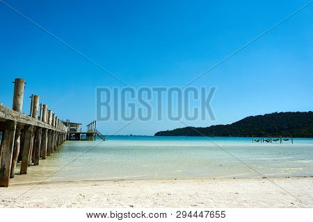 Pier At Beach At Nice Sunny Summer Day. Koh Rong Sanloem Island, Saracen Bay. Cambodia, Asia