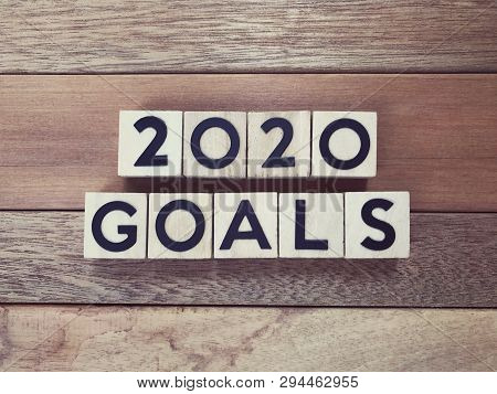 New Year Goal Concept - 2020 Goals Written On Wooden Blocks.