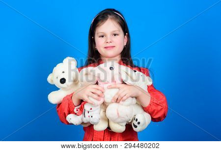 Collecting Toys Hobby. Cherishing Memories Of Childhood. Childhood Concept. Small Girl Smiling Face 